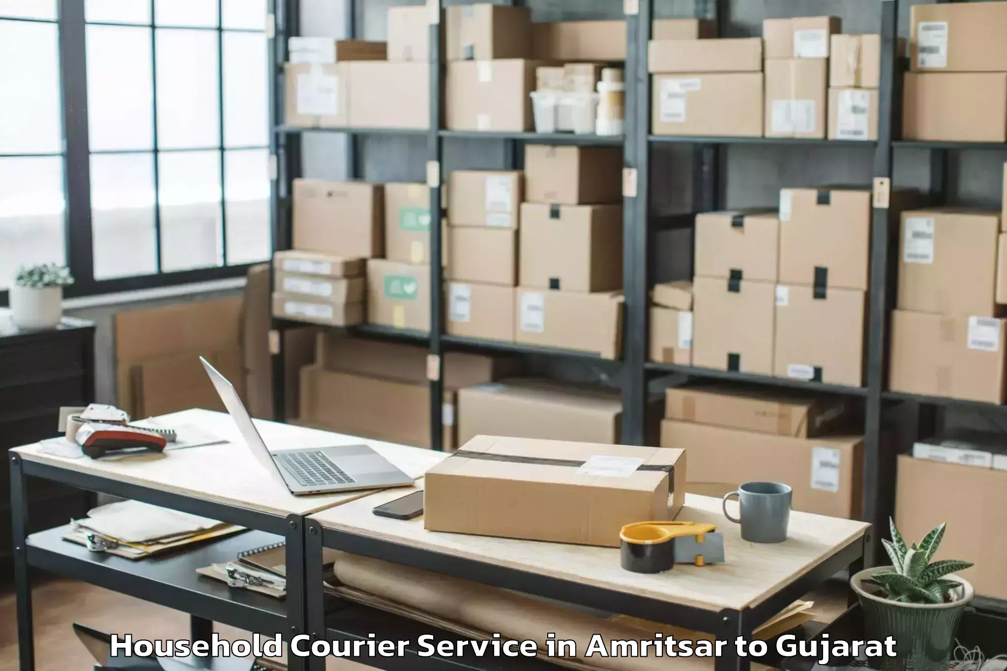 Trusted Amritsar to Jhagadia Household Courier